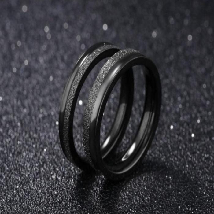 Black titanium promise rings